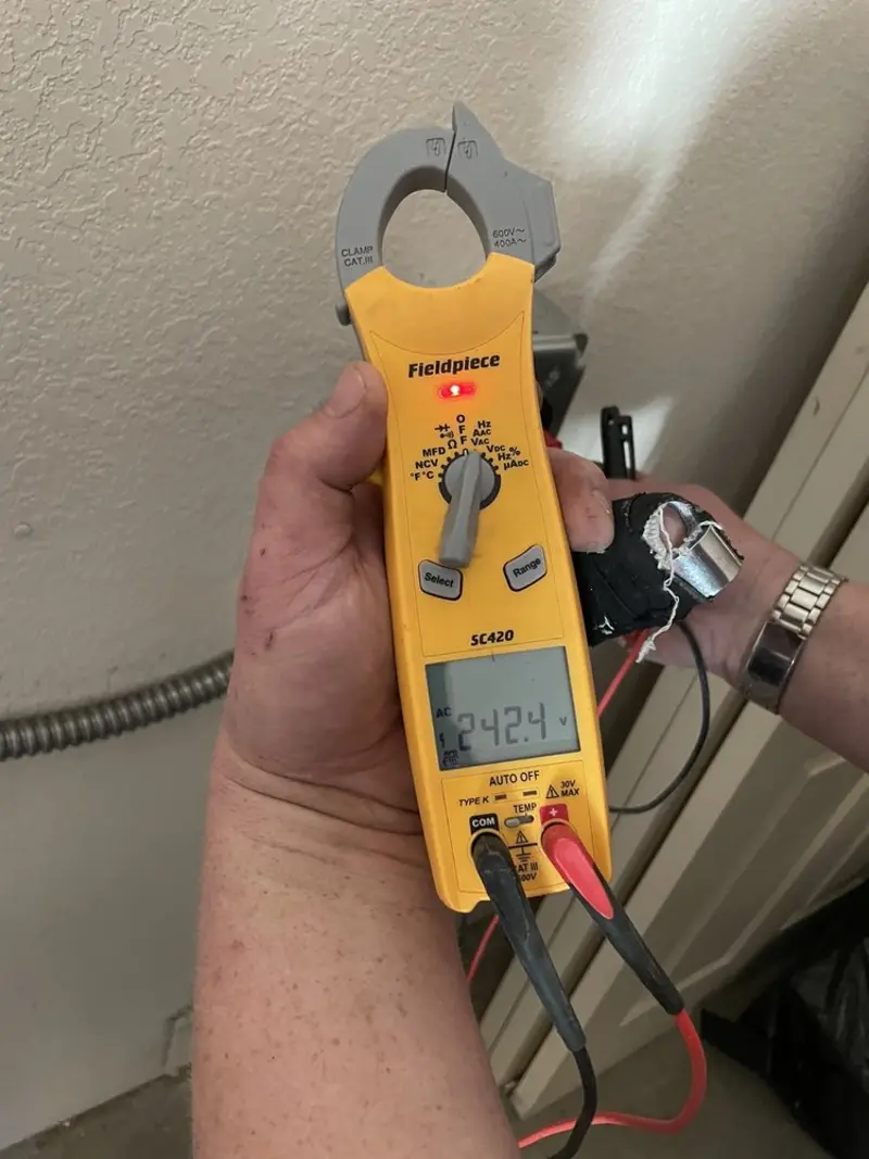 Voltage testing with clamp meter during Circuit Breaker Repair in Haslet